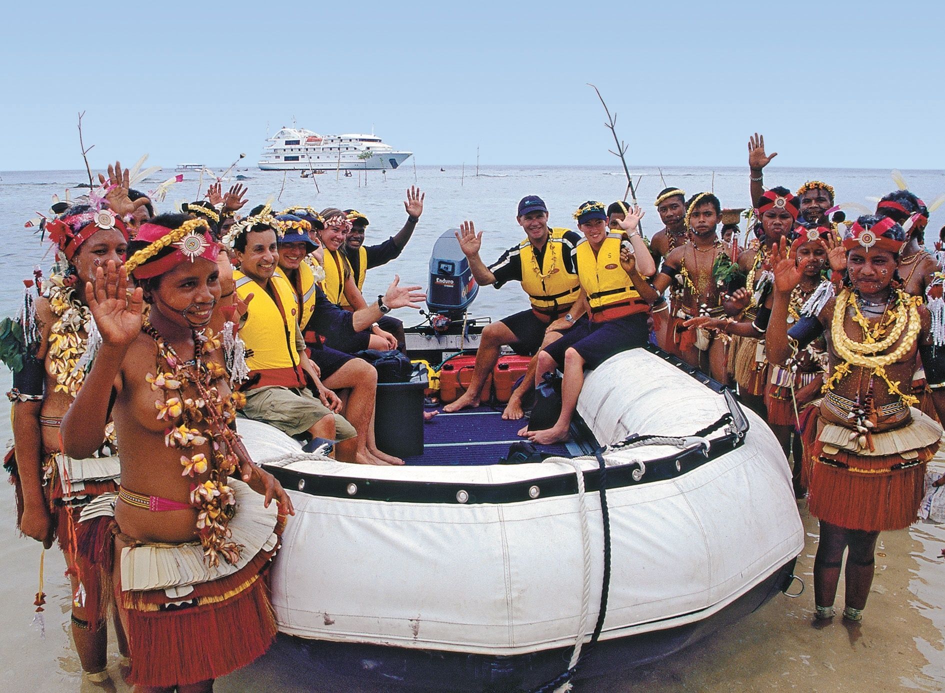 Papua New Guinean villagers welcome Coral Discoverer ship